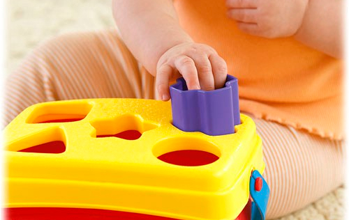 shape-sorter-toy-with-child-e1498686245582.jpg